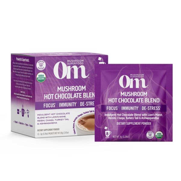 Image of full box of Om Mushroom Superfood Organic Hot Chocolate containing 10 packets each with 8g servings delivering super 'shroomies Lion's Mane, Reishi, Chaga, and Turkey Tail plus adaptogenic herb Ashwagandha to balance the nervous system, boost immunity, lower inflammation, improve mental clarity and focus, and enhance overall health.